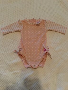 Ruffle Butts Pink Polka Dot Rashguard One-Piece with Striped Sleeves